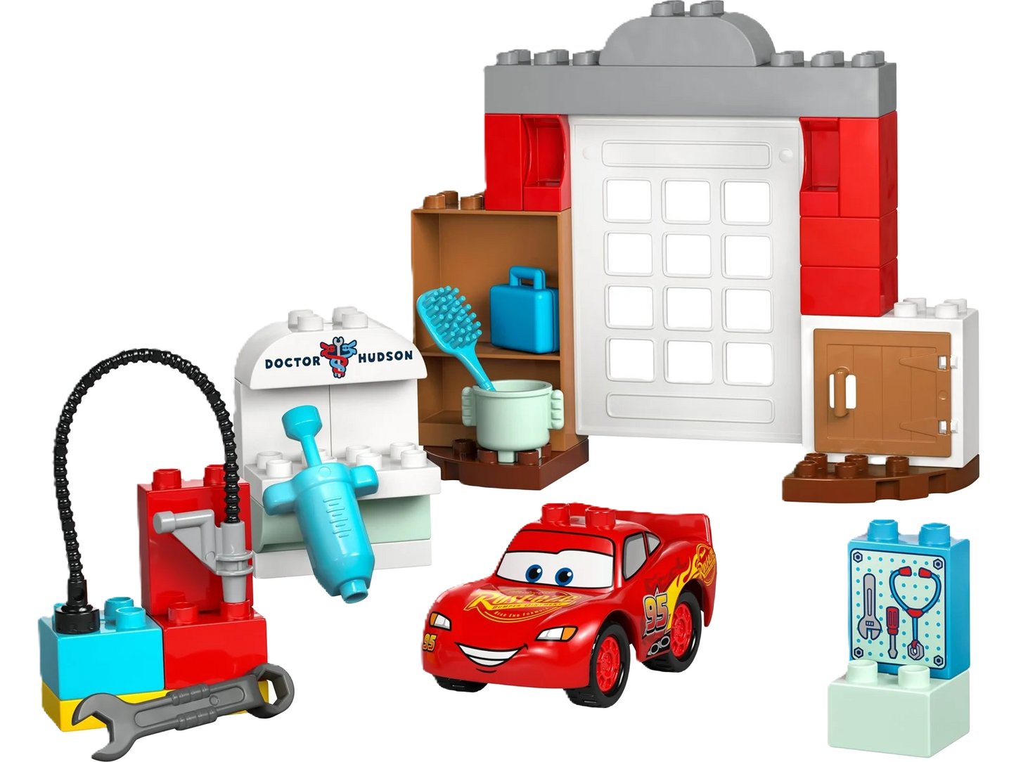 Lego Duplo “Lynet McQueen besøg i Docs værksted” – farverigt Duplo-sæt med Lynet McQueen og Doc Hudson i deres værksted. Perfekt til små bil-entusiaster og kreativ leg.