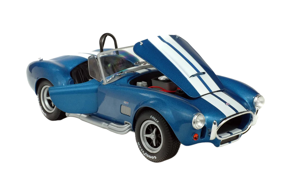 Solido Shelby Cobra 427 MKII 1965 1:18 â Detaljeret diecast-model af den klassiske Shelby Cobra 427 MKII fra 1965 i skala 1:18. Udført i metal, med ĂĽbne døre, justerbare forhjul, sidespejle og autentisk design â ideal for bilentusiaster og samlere.