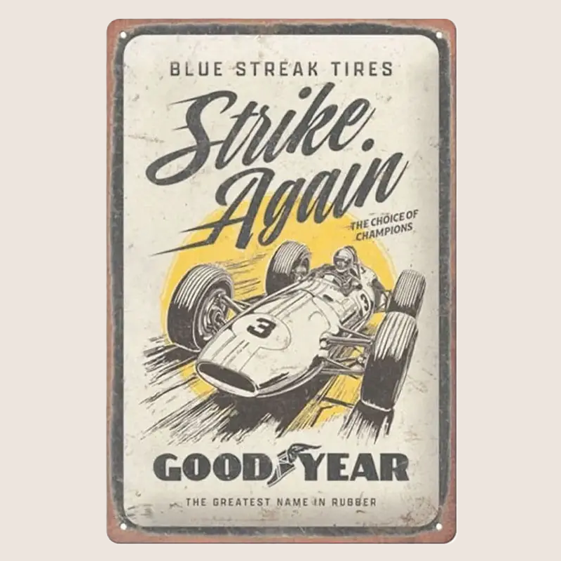 Goodyear Blue Streak Tires Strike Again – Retro metalskilt med vintage Goodyear-dækreklame og klassisk blå/gul grafik. Perfekt til garage, værksted eller samlerhylde.