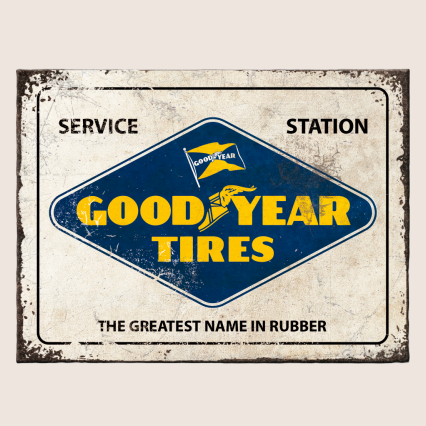 Goodyear Logo Magnet – Klassisk hvid magnet med det ikoniske Goodyear-logo i blå og gult. Perfekt til køleskab eller værksted for fans af bilhistorie og vintage design.