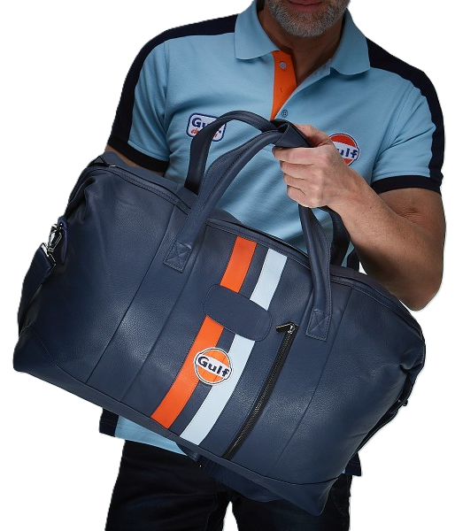 Gulf Leather Travelbag Navy Large – Stor og rummelig rejsetaske i navyblåt læder med ikoniske Gulf-detaljer. Ideel til længere ture med både stil og funktionalitet.